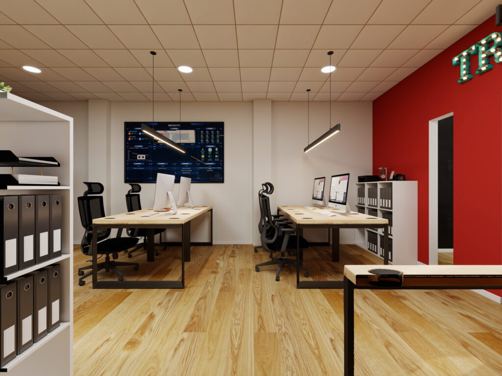 modern office interior with desks computers red accent wall scaled.jpg